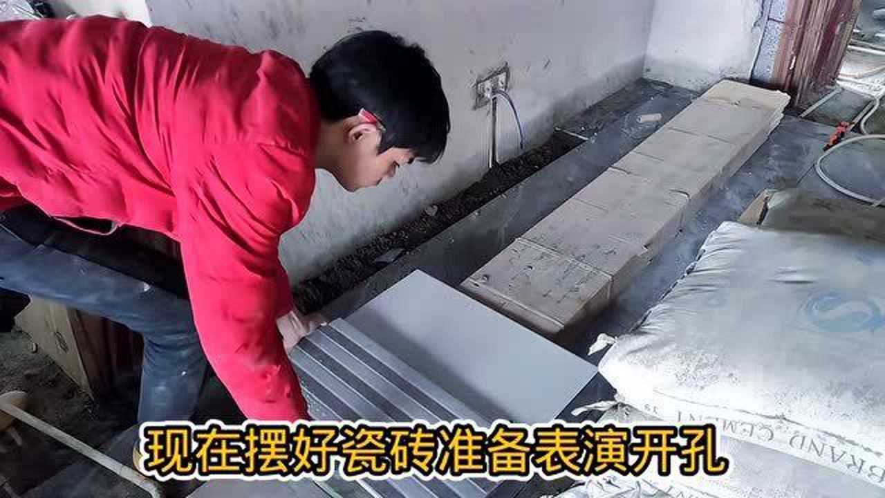 墙砖上打孔技巧视频(在墙砖上打孔怎么打墙砖才不会破)